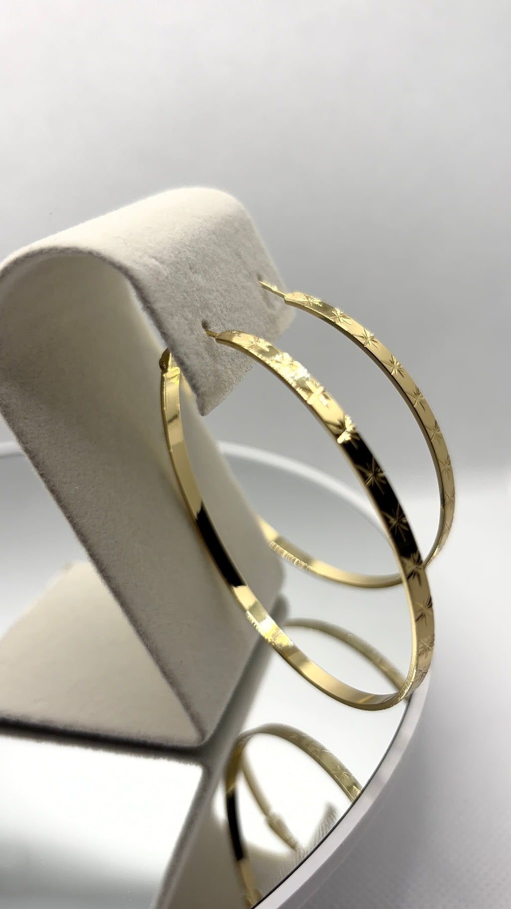 Gold Star-Engraved Hoop Earrings