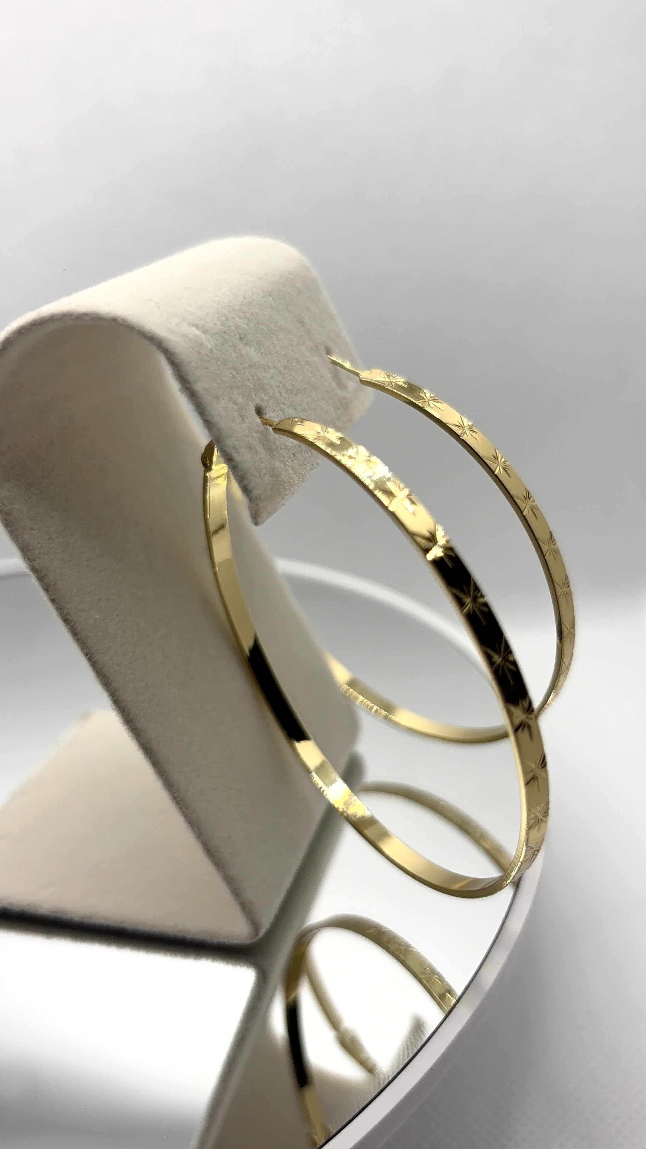 Gold Star-Engraved Hoop Earrings