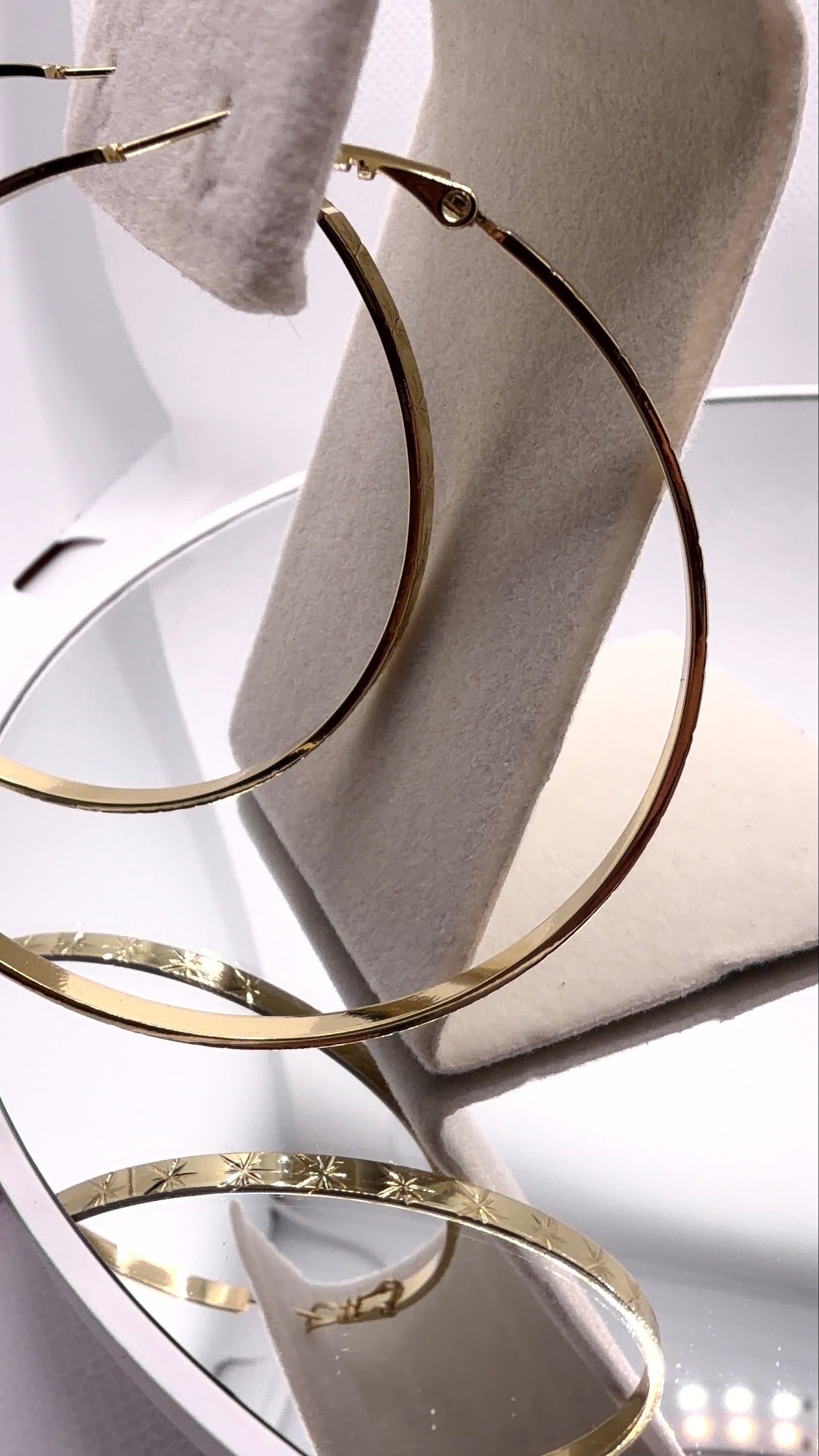 Gold Star-Engraved Hoop Earrings