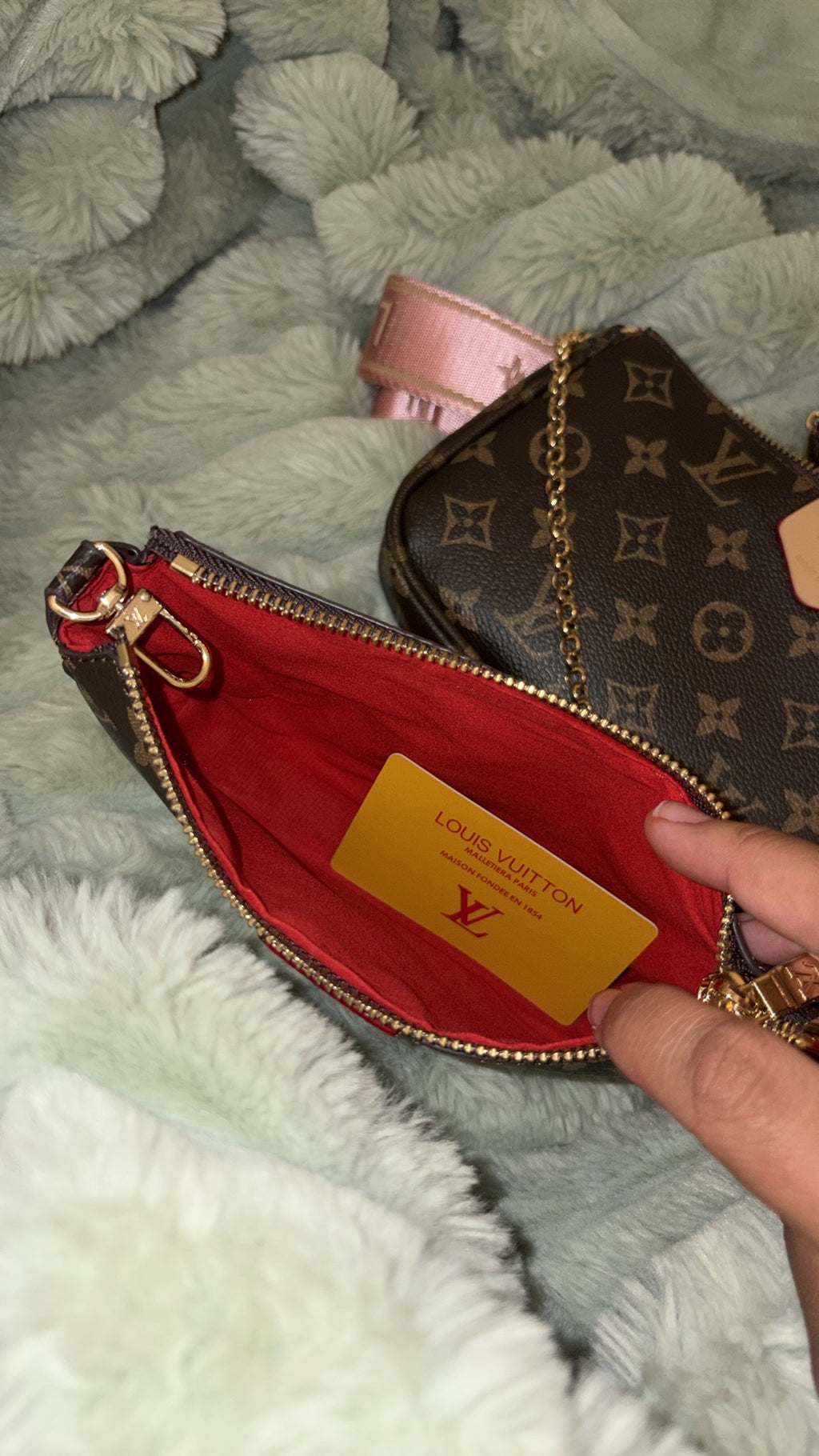 LV monogram pochette interior with authenticity card