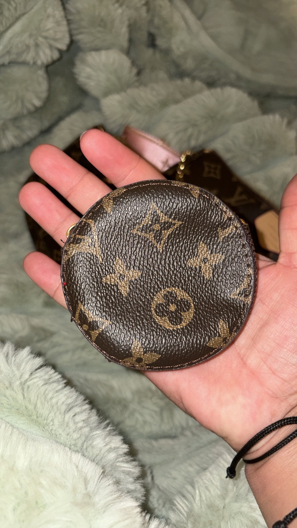 LV monogram round coin purse close-up