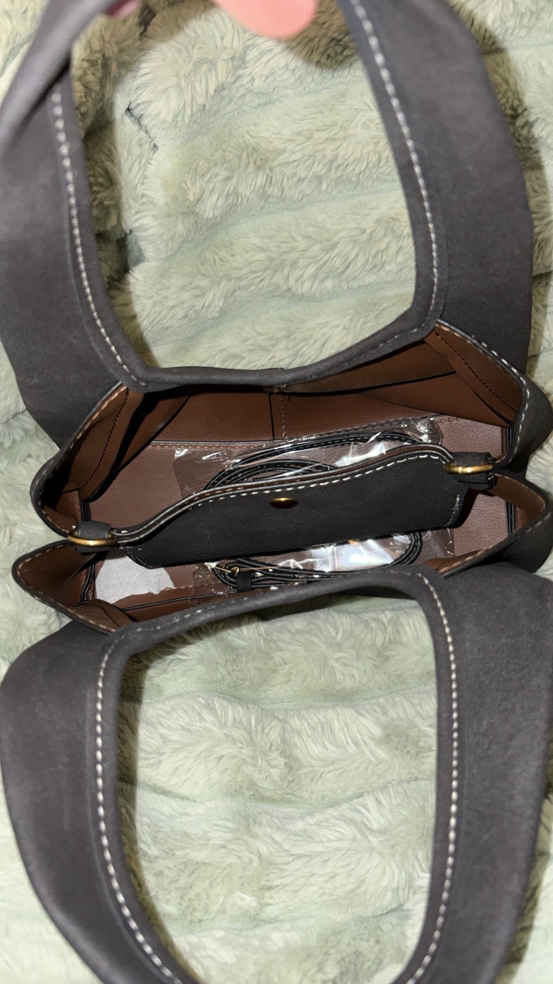 Coach Lana suede hobo bag interior view showing brown leather lining
