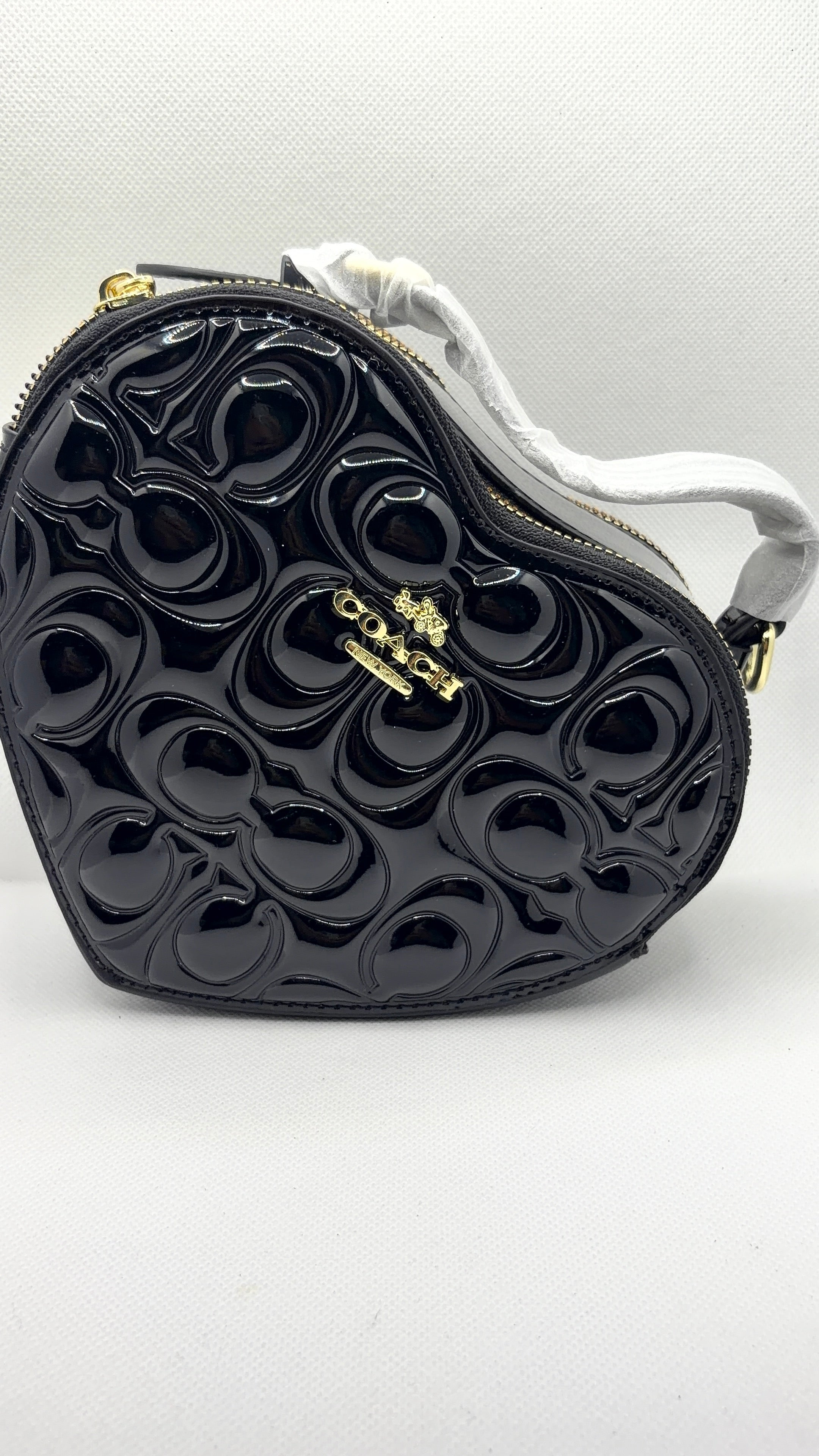 Coach heart bag black patent leather close-up