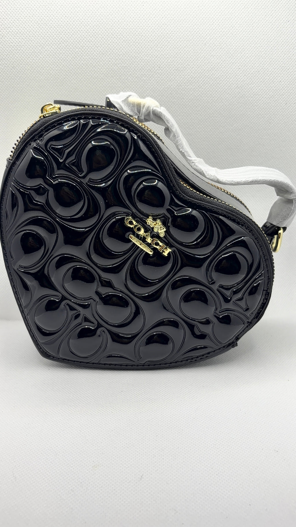 Coach heart bag black patent leather front view