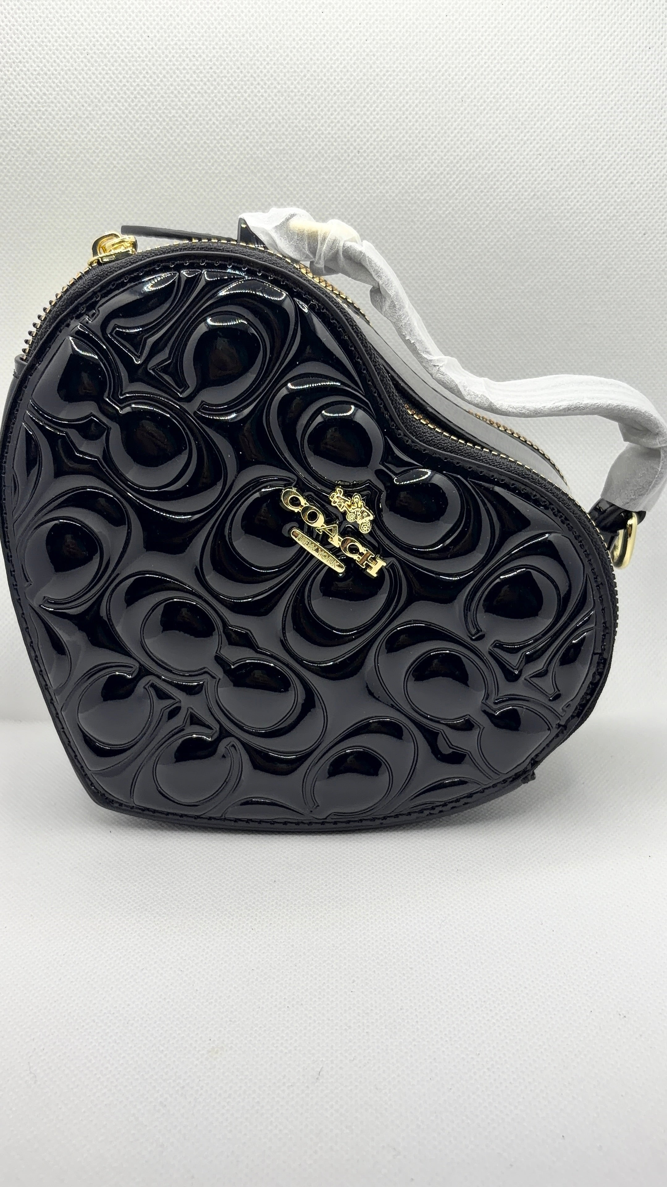 Coach heart bag black patent leather front view
