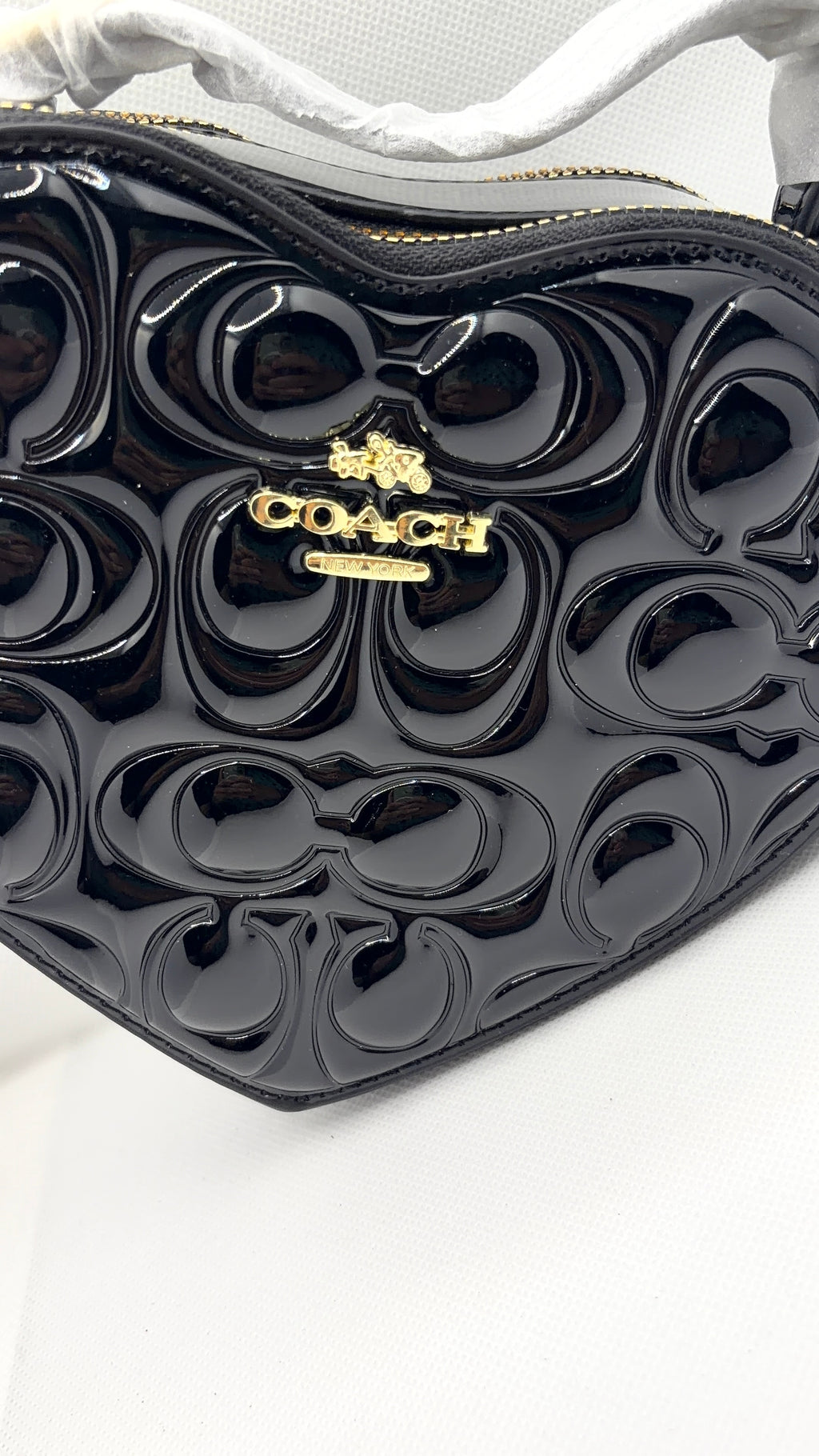 Coach heart bag black patent leather angle view