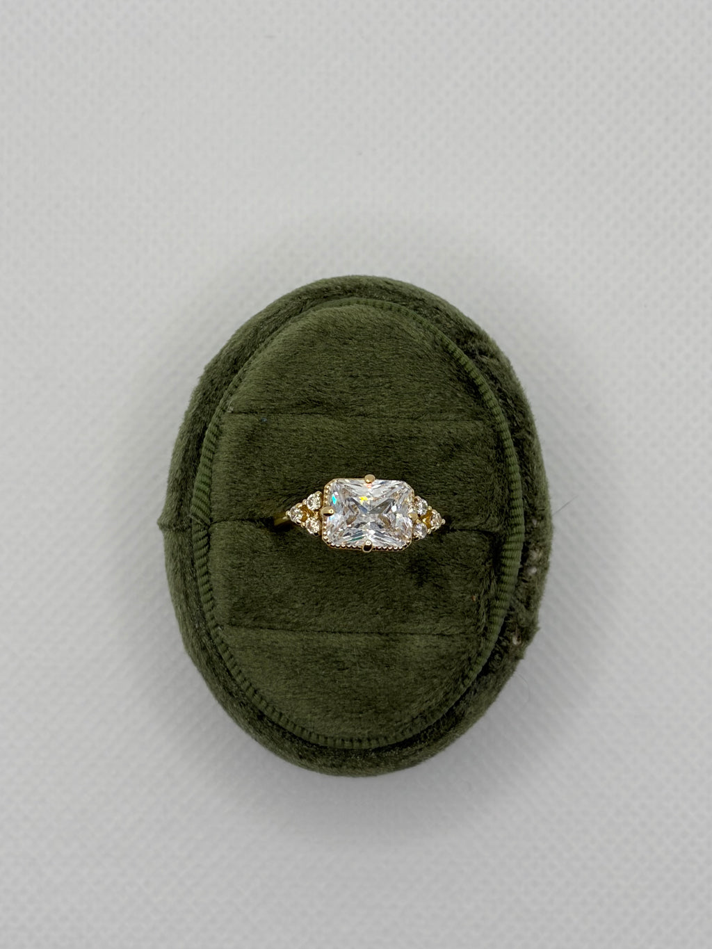 Emerald-Cut Three-Stone Engagement Ring