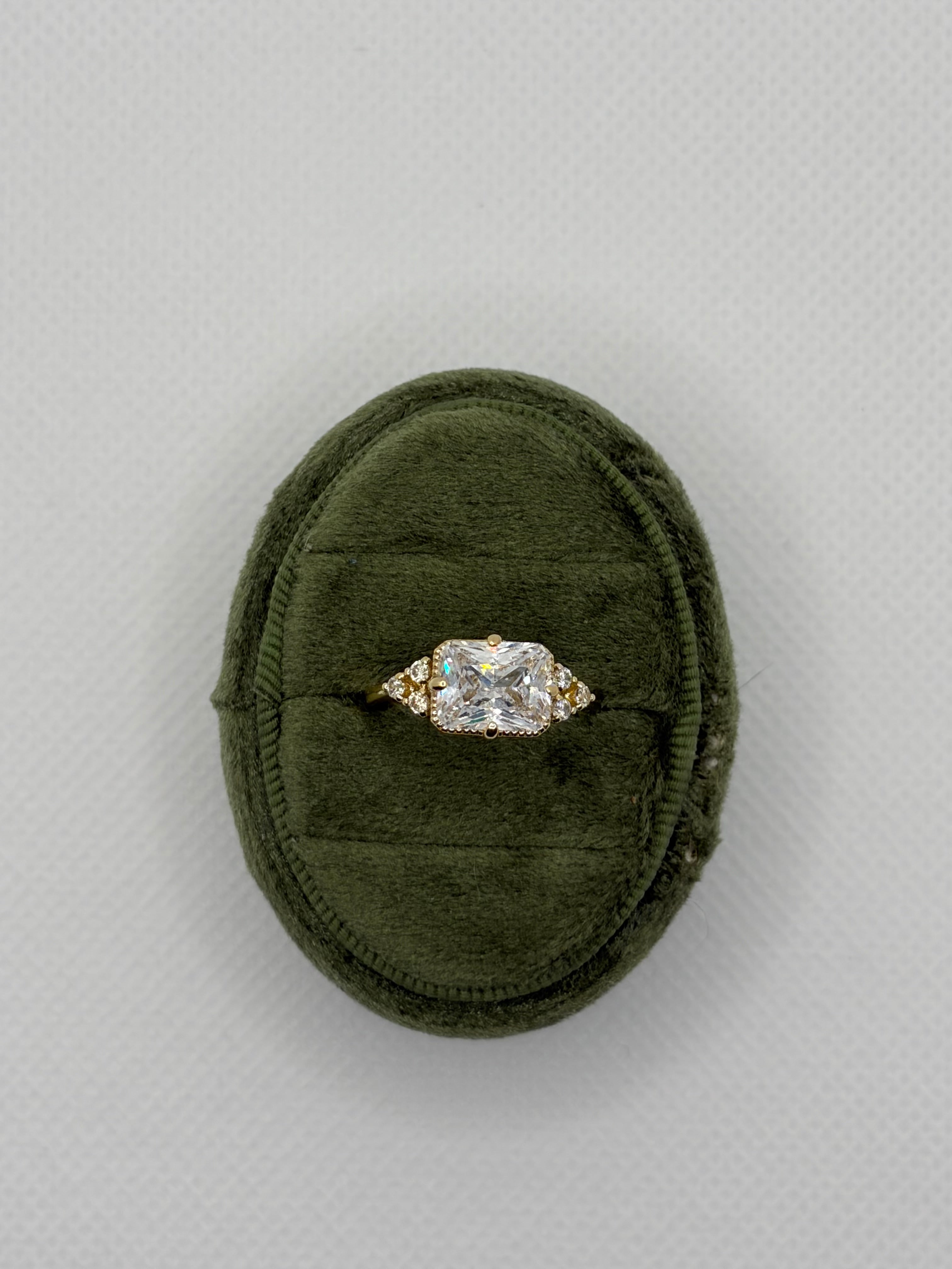 Emerald-Cut Three-Stone Engagement Ring