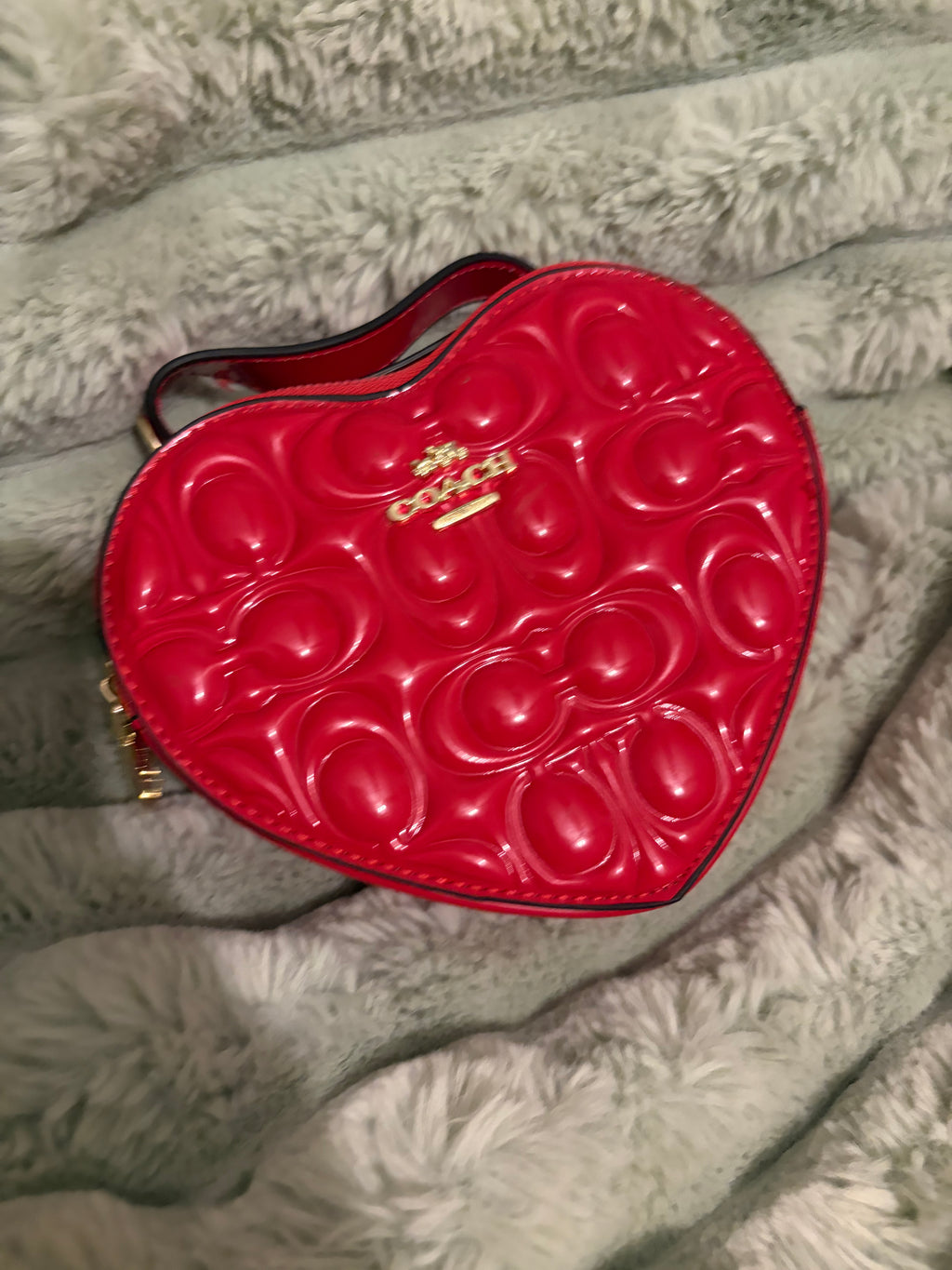 Coach heart bag red patent leather front view