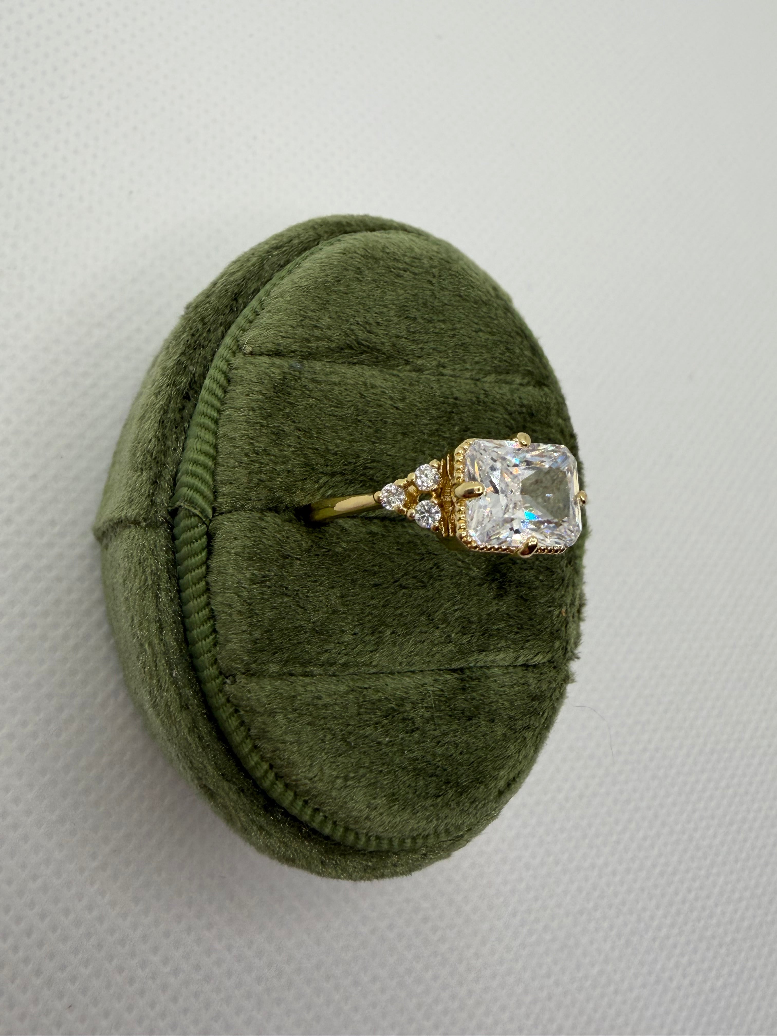 Emerald-Cut Three-Stone Engagement Ring