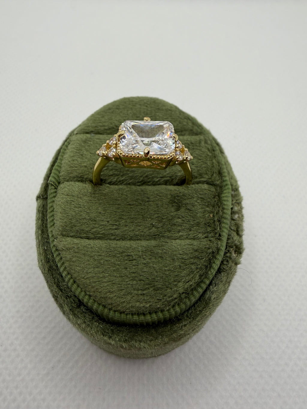 Emerald-Cut Three-Stone Engagement Ring