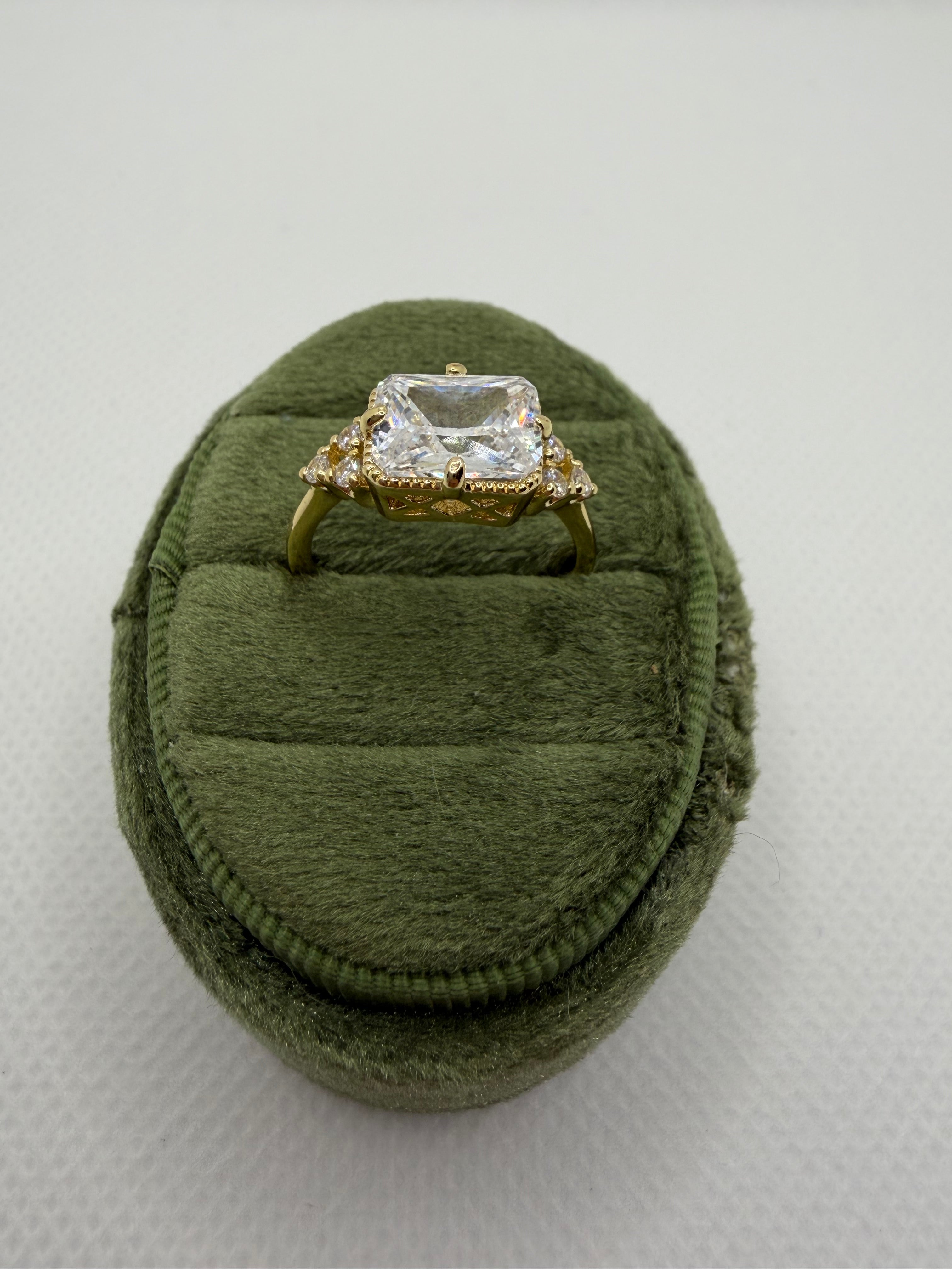 Emerald-Cut Three-Stone Engagement Ring