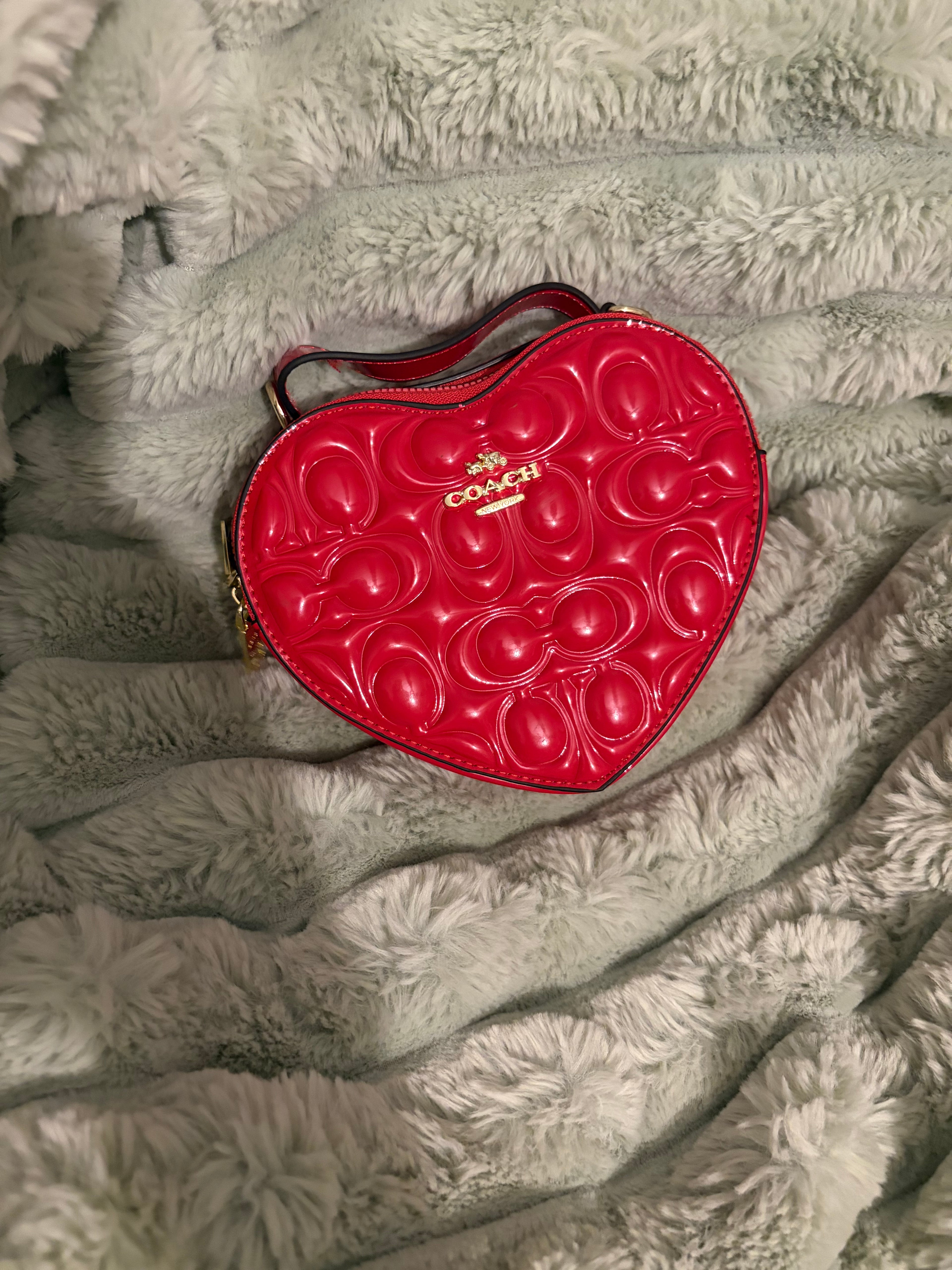 Coach heart bag red patent leather angle view