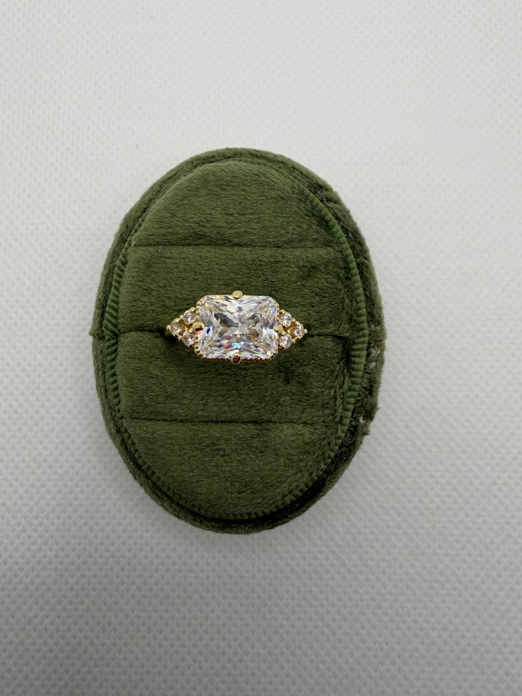 Emerald-Cut Three-Stone Engagement Ring