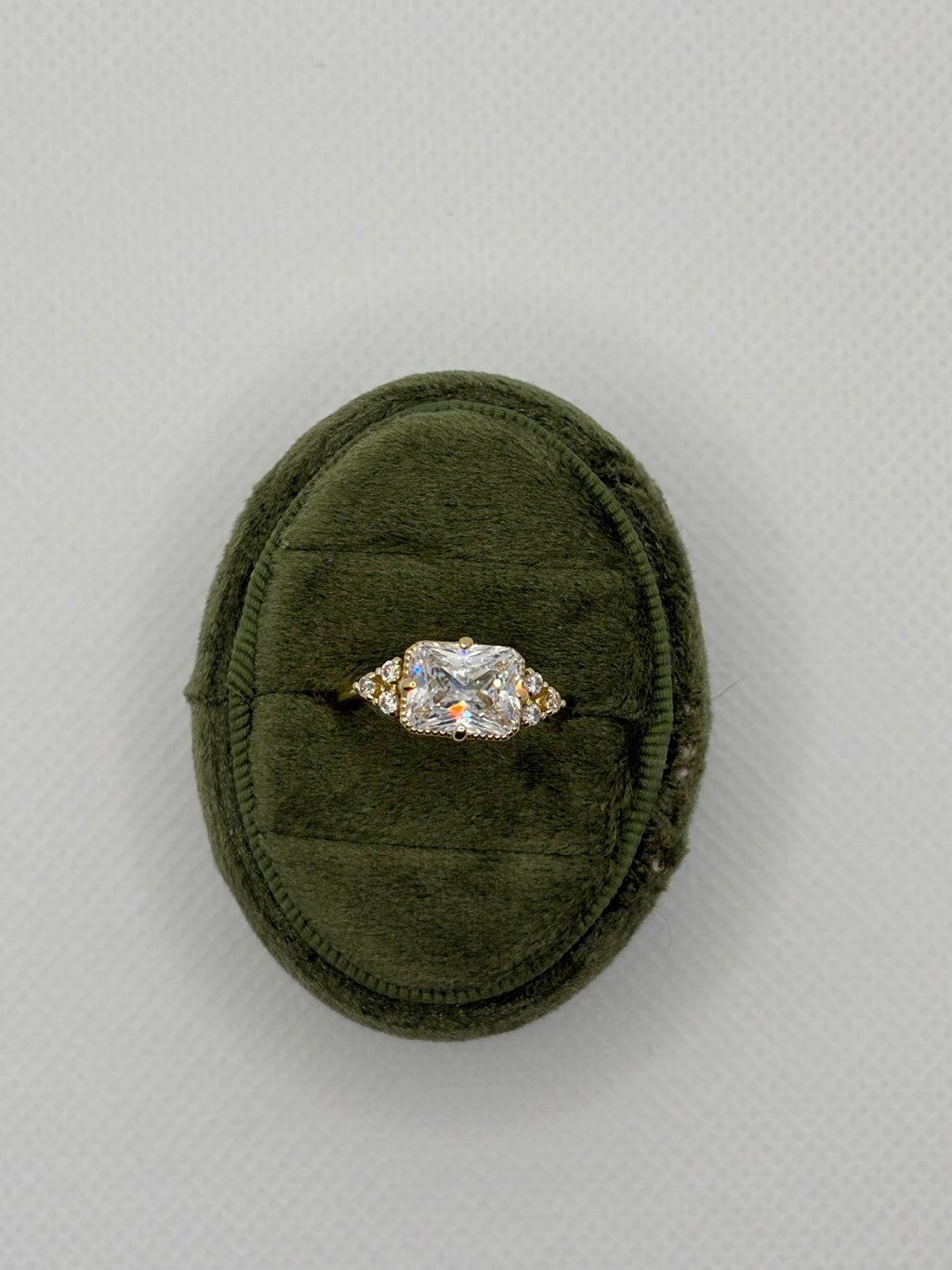 Emerald-Cut Three-Stone Engagement Ring
