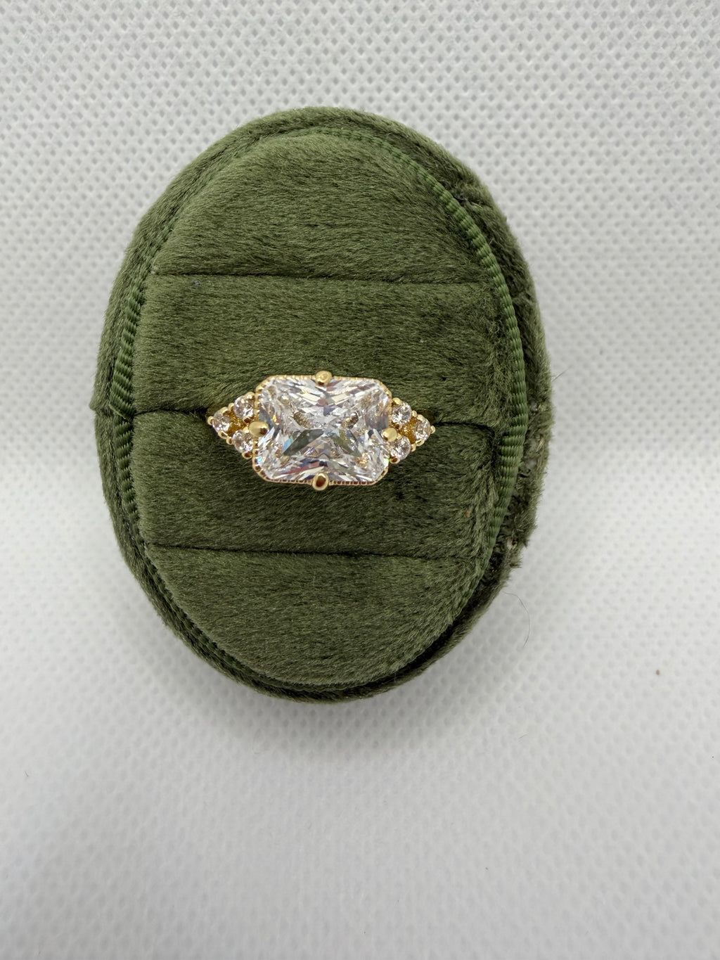 Emerald-Cut Three-Stone Engagement Ring